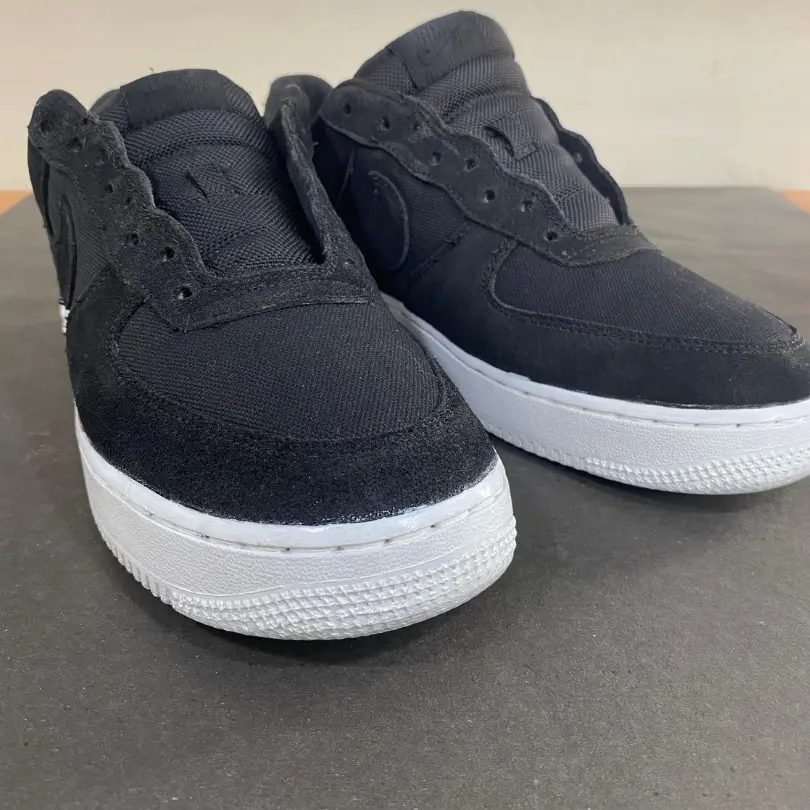 Sepatu dengan warna segar merata setelah di-repaint di Rawatin